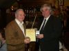 Robert Close receiving his award